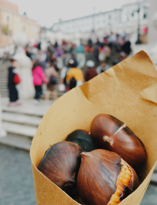 Close up of roasted chestnuts wrapped in paper